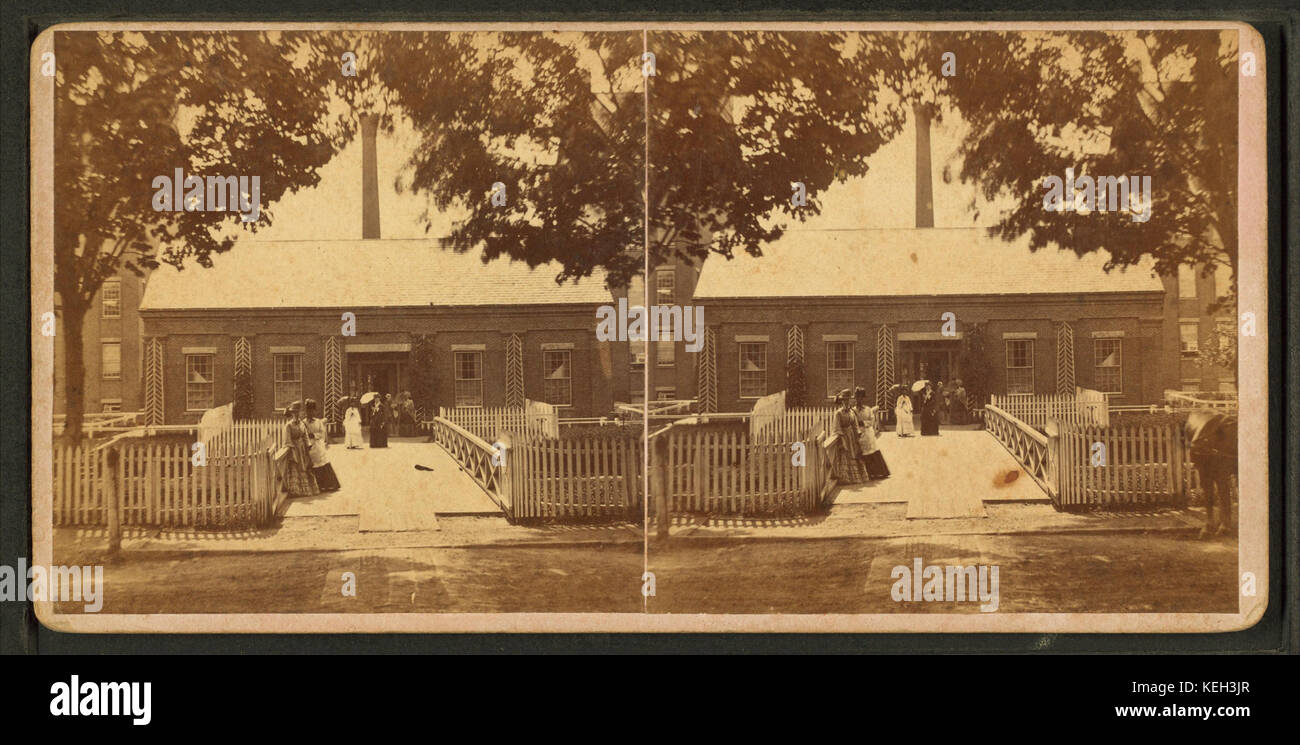 Ladies standing at the front of a building, by Conant Bros. 2 Stock