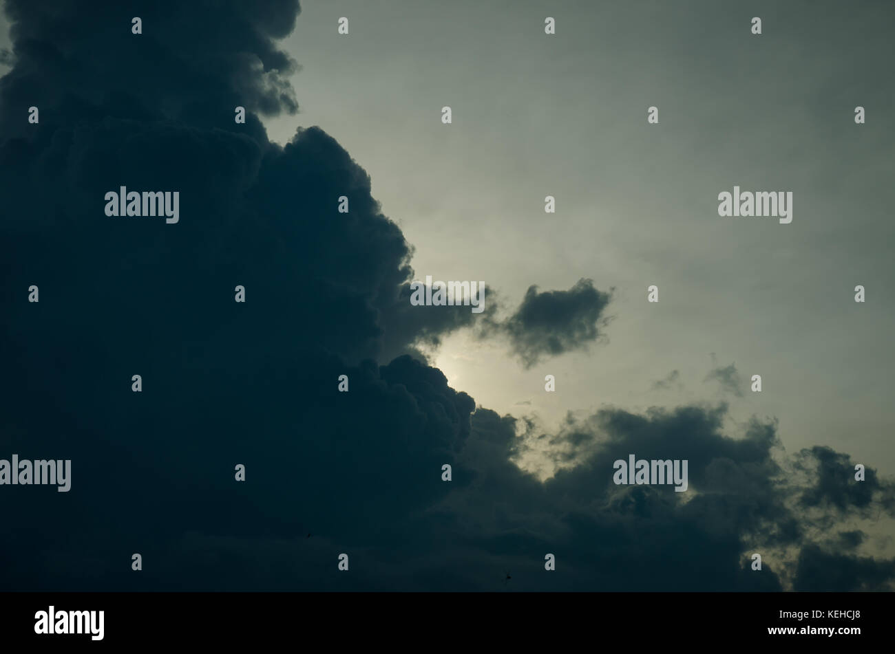 Dramatic dark storm clouds before rainy in Thailand Stock Photo - Alamy