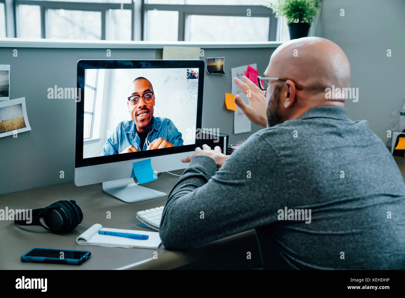 Businessmen on video conference Stock Photo