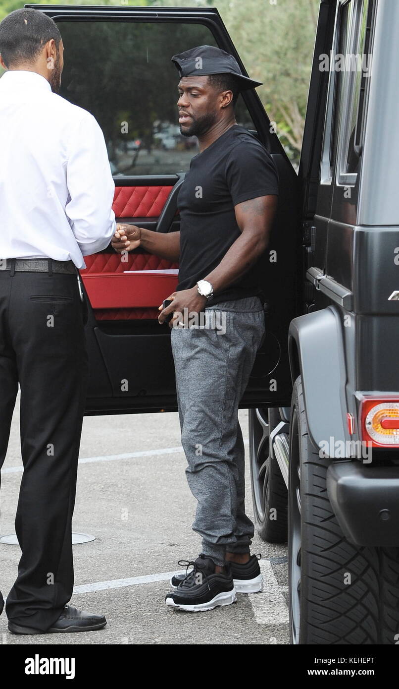 Kevin Hart and his pregnant wife Eniko entering Joey Woodland Hills