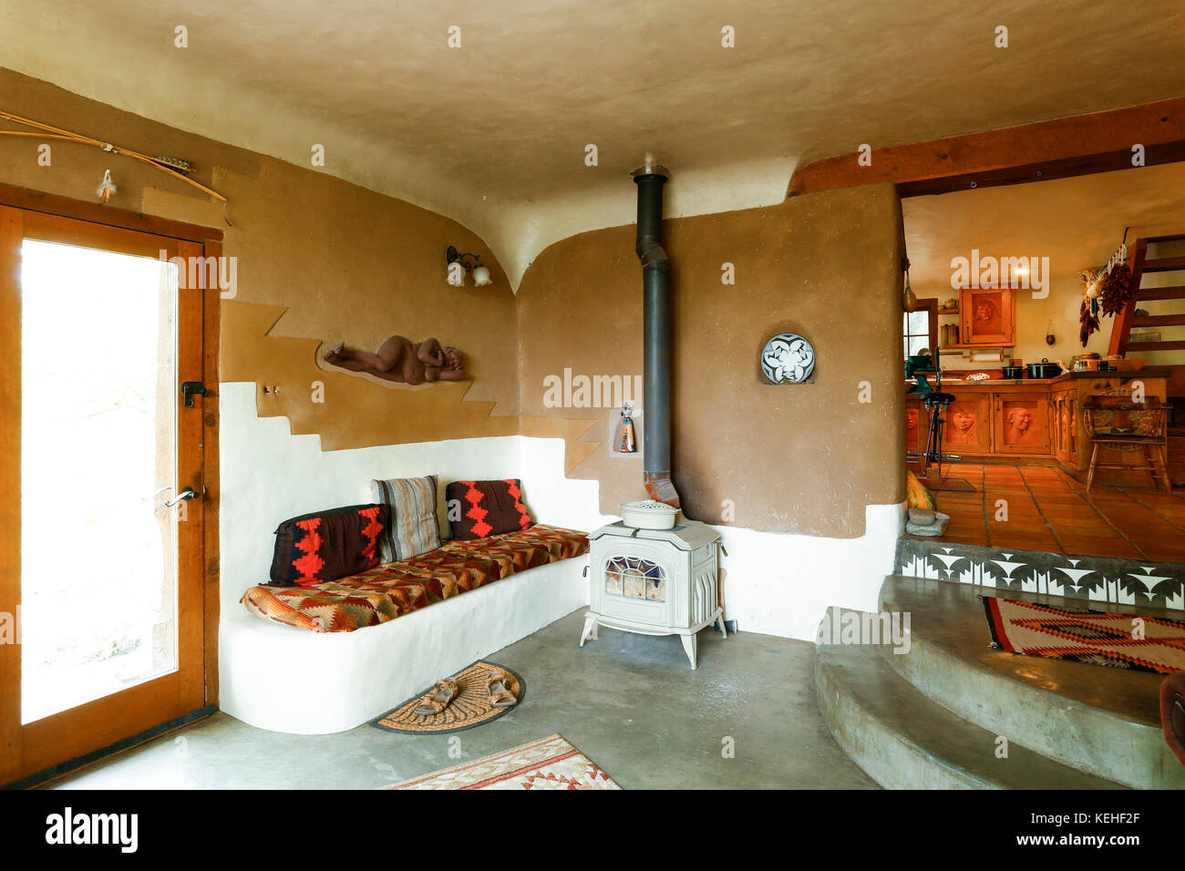 Wood-burning stove in livingroom Stock Photo