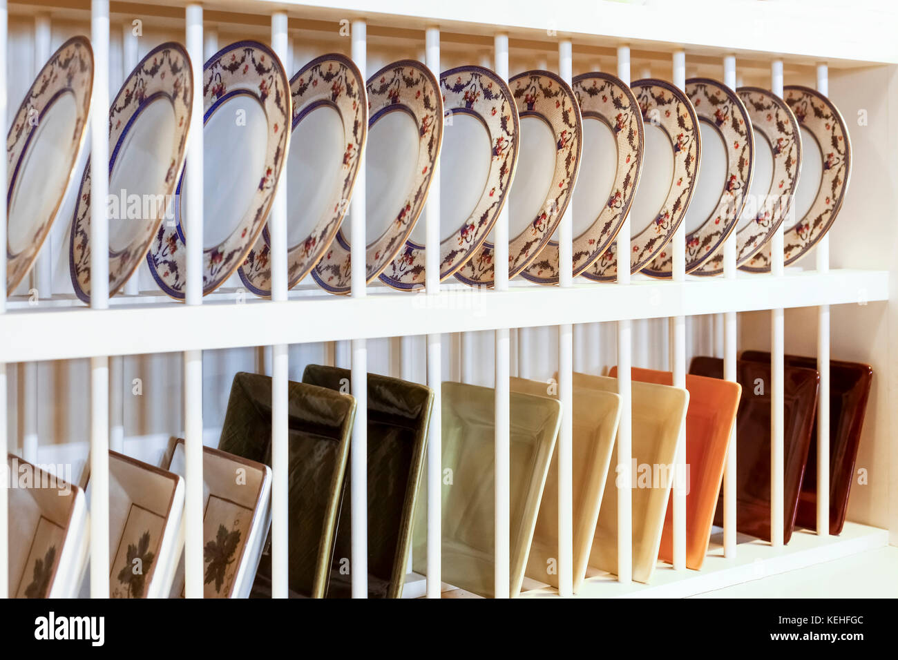 Round and square plates on display Stock Photo Alamy