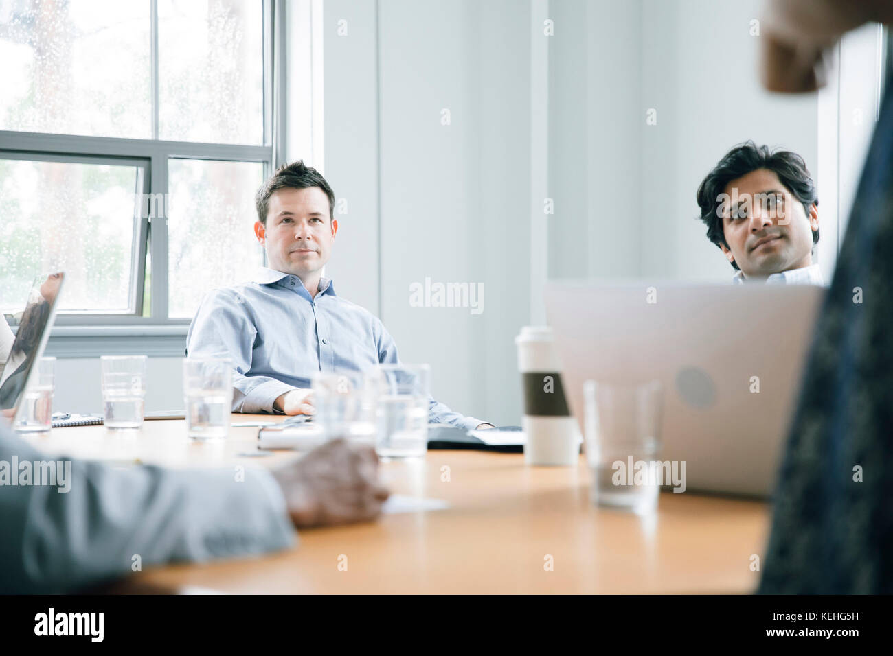 Business people listening in meeting Stock Photo