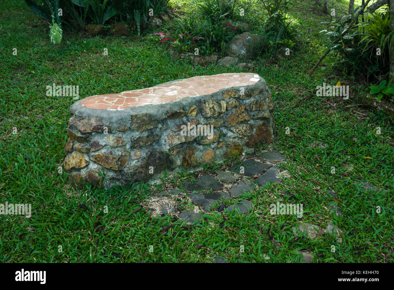 Garden bench made of stones Stock Photo Alamy