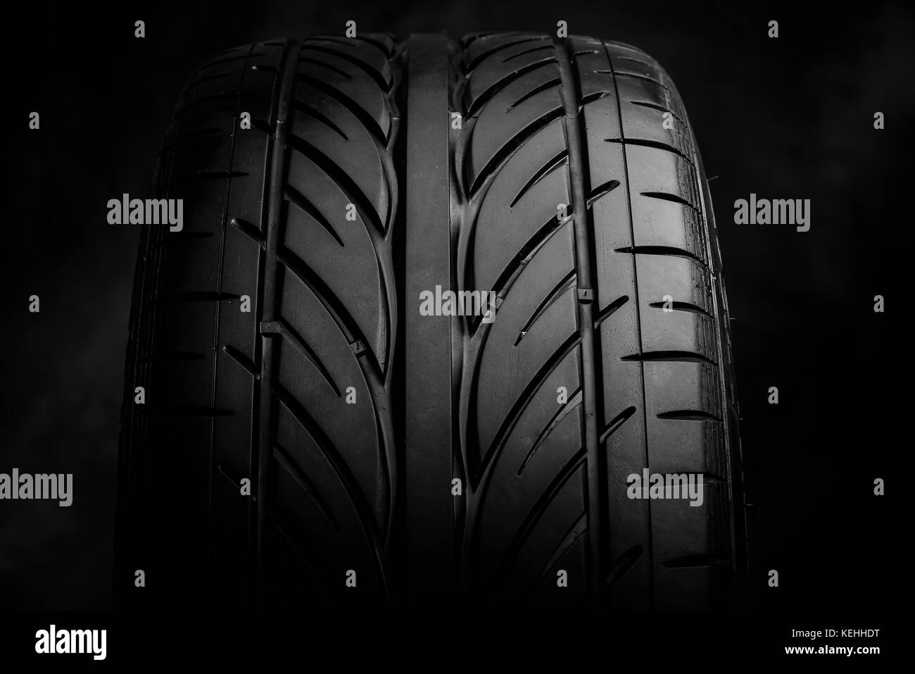 Car tires on a dark background Stock Photo Alamy