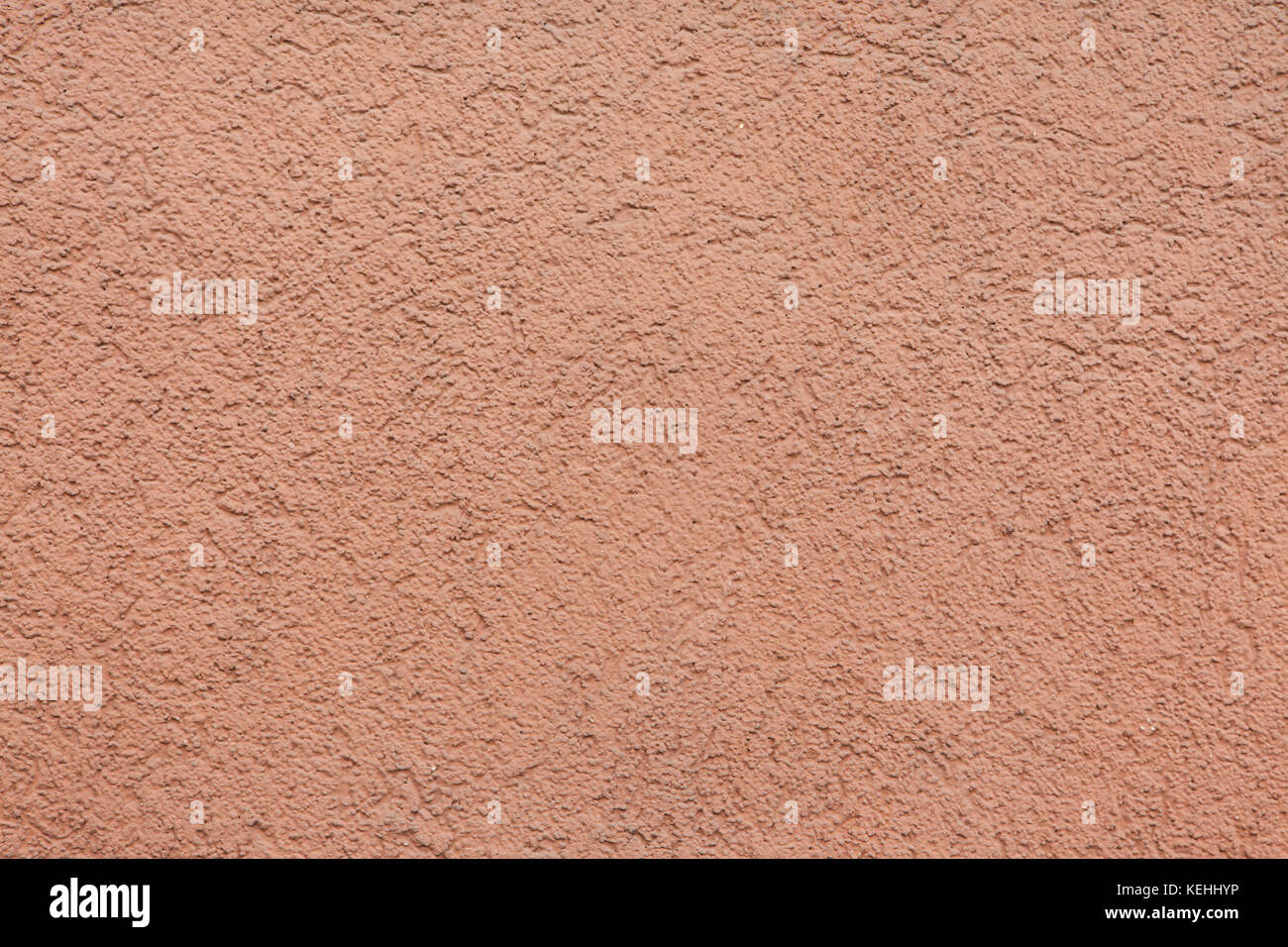Pink painted stucco wall. Background texture. Stock Photo