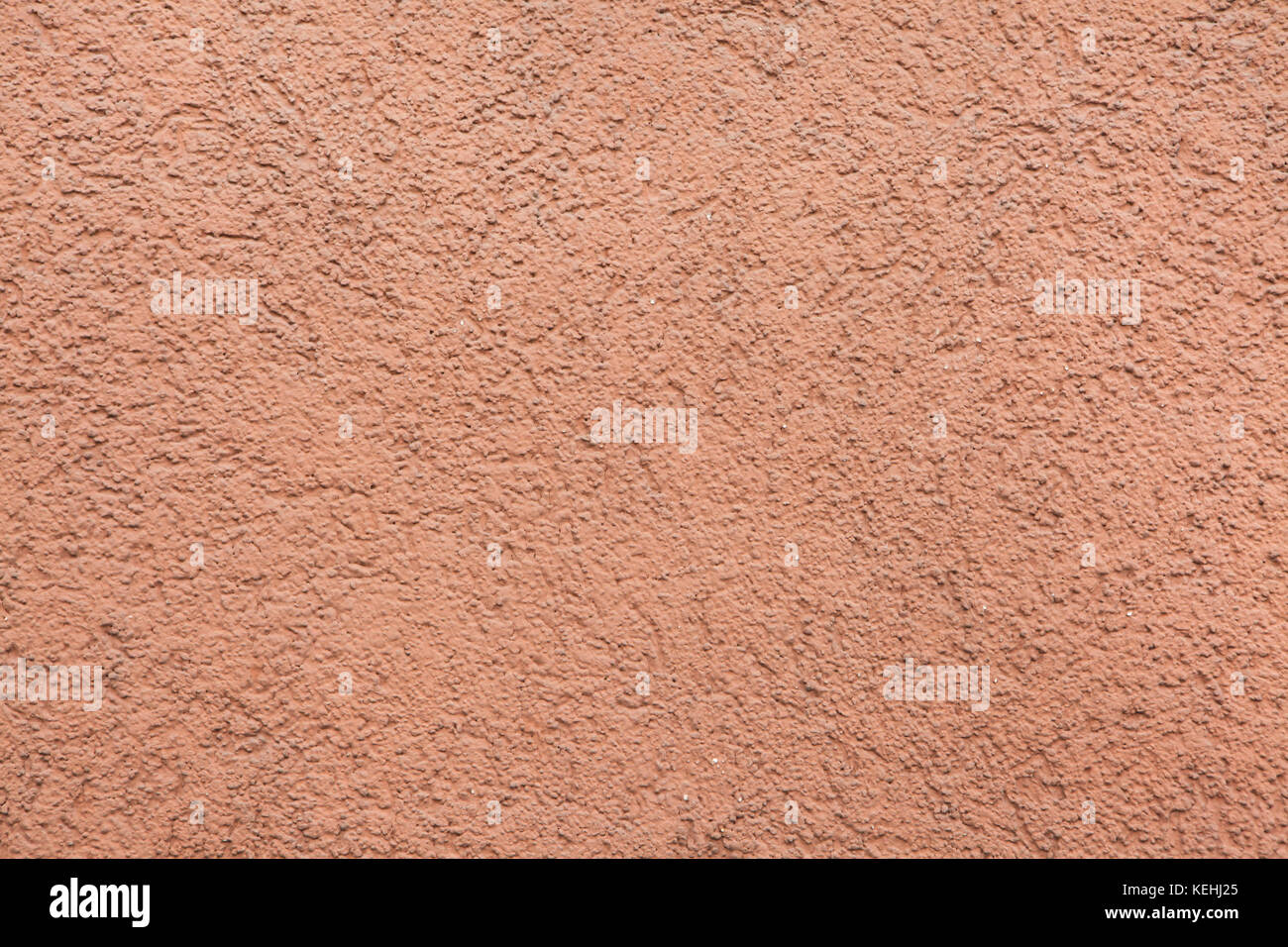 Pink painted stucco wall. Background texture. Stock Photo