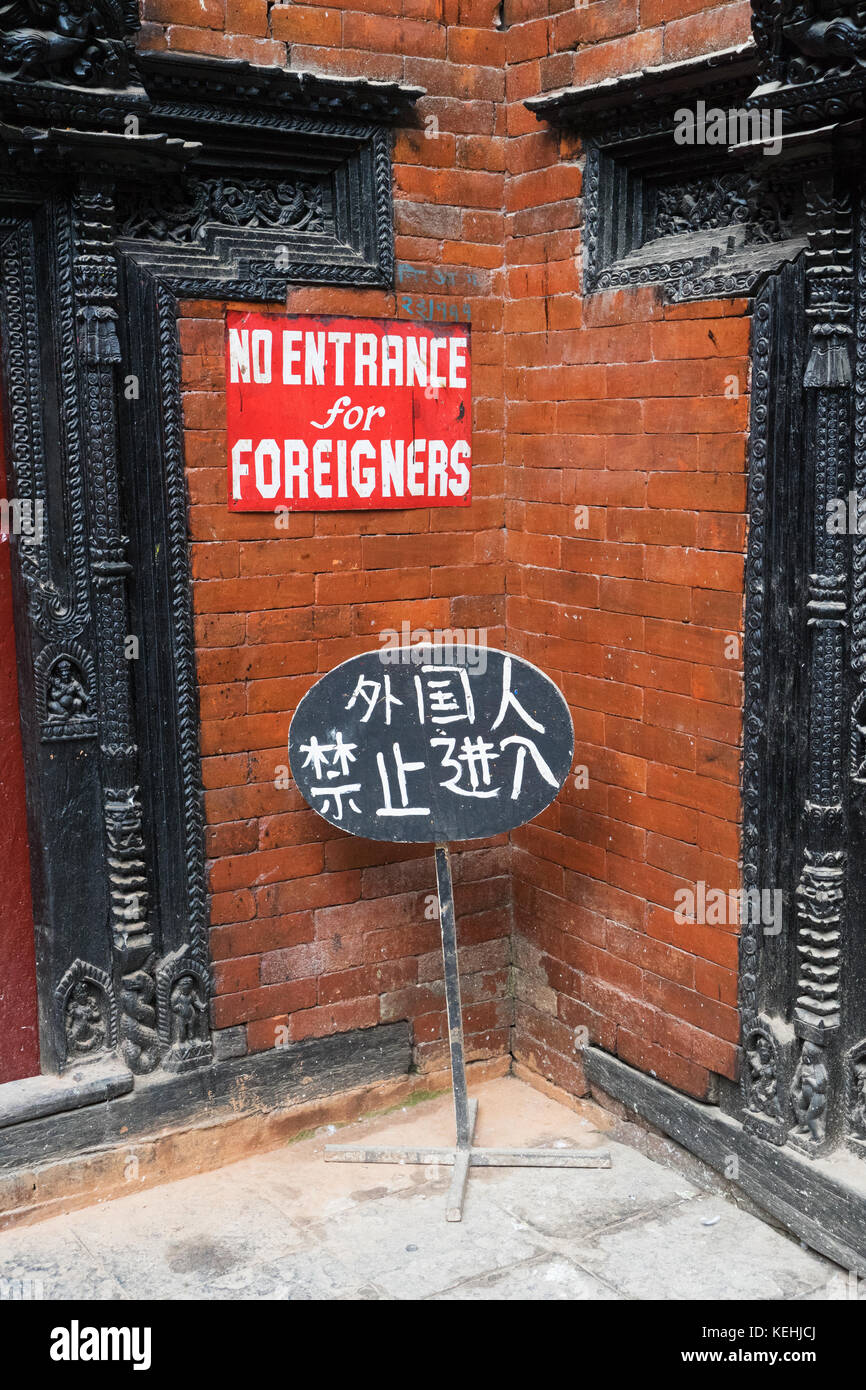 Sign interdicting entrance to foreigners at Kumari Bahal Chowk, Durbar Square, Kathmandu. Stock Photo