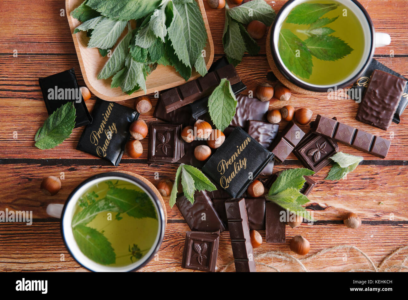 Premium quality chocolate near green tea Stock Photo