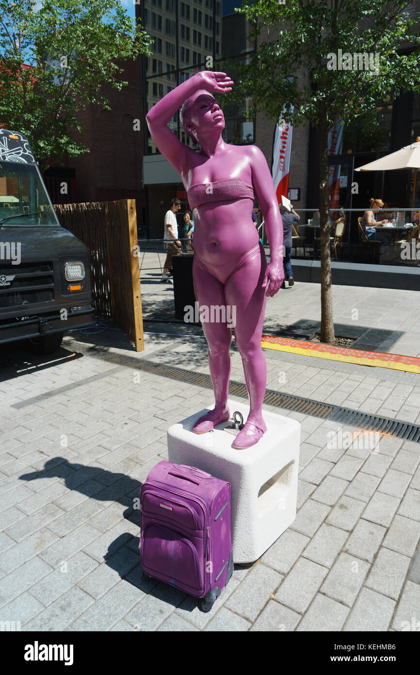 The Mysterious Rainbow People performing in dowtown Montreal, province of Quebec, Canada. Stock Photo