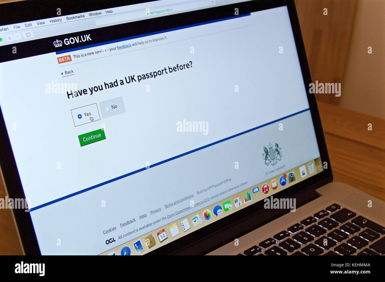 Online UK passport application form on MacBook Pro laptop screen Stock Photo