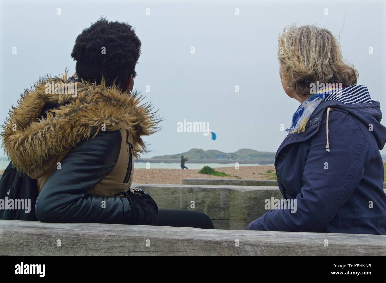 Man watching woman on beach hi-res stock photography and images - Alamy