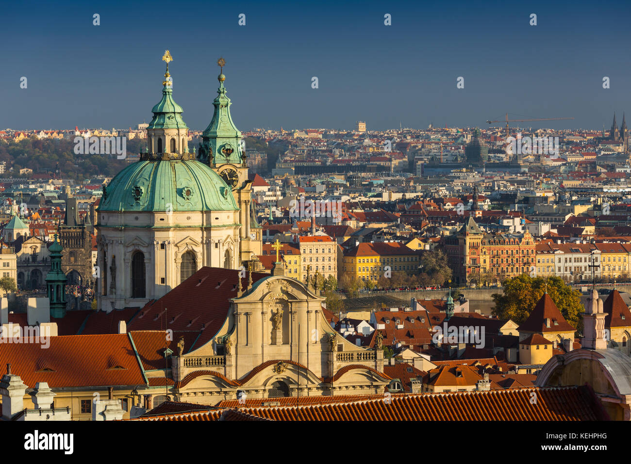 Aerial view over Church of Our Lady before Tyn, Old Town and Prague Castle at sunset in Prague, Czech Republic. Stock Photo