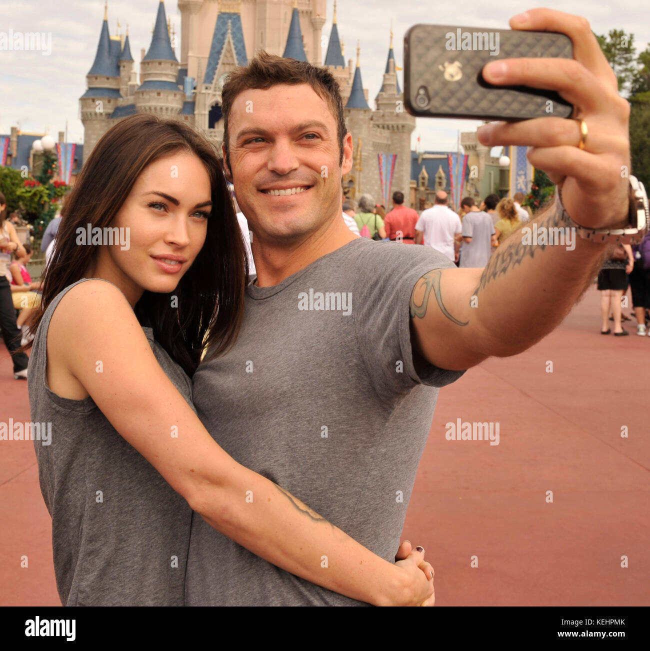 (Nov. 26, 2010):  Actor Brian Austin Green (right) and his wife, actress/model Megan Fox (left), take a souvenir photo Nov. 26, 2010 in the Magic Kingdom in Lake Buena Vista, Fla.  Green ('Beverly Hills, 90210', 'Desperate Housewives') and Fox ('Transformers,' 'Transformers: Revenge of the Fallen') were married in June 2010 in Hawaii.    People:  Megan Fox Brian Austin Green  Transmission Ref:  MNC   Credit: Hoo-me.com/MediaPunch Stock Photo