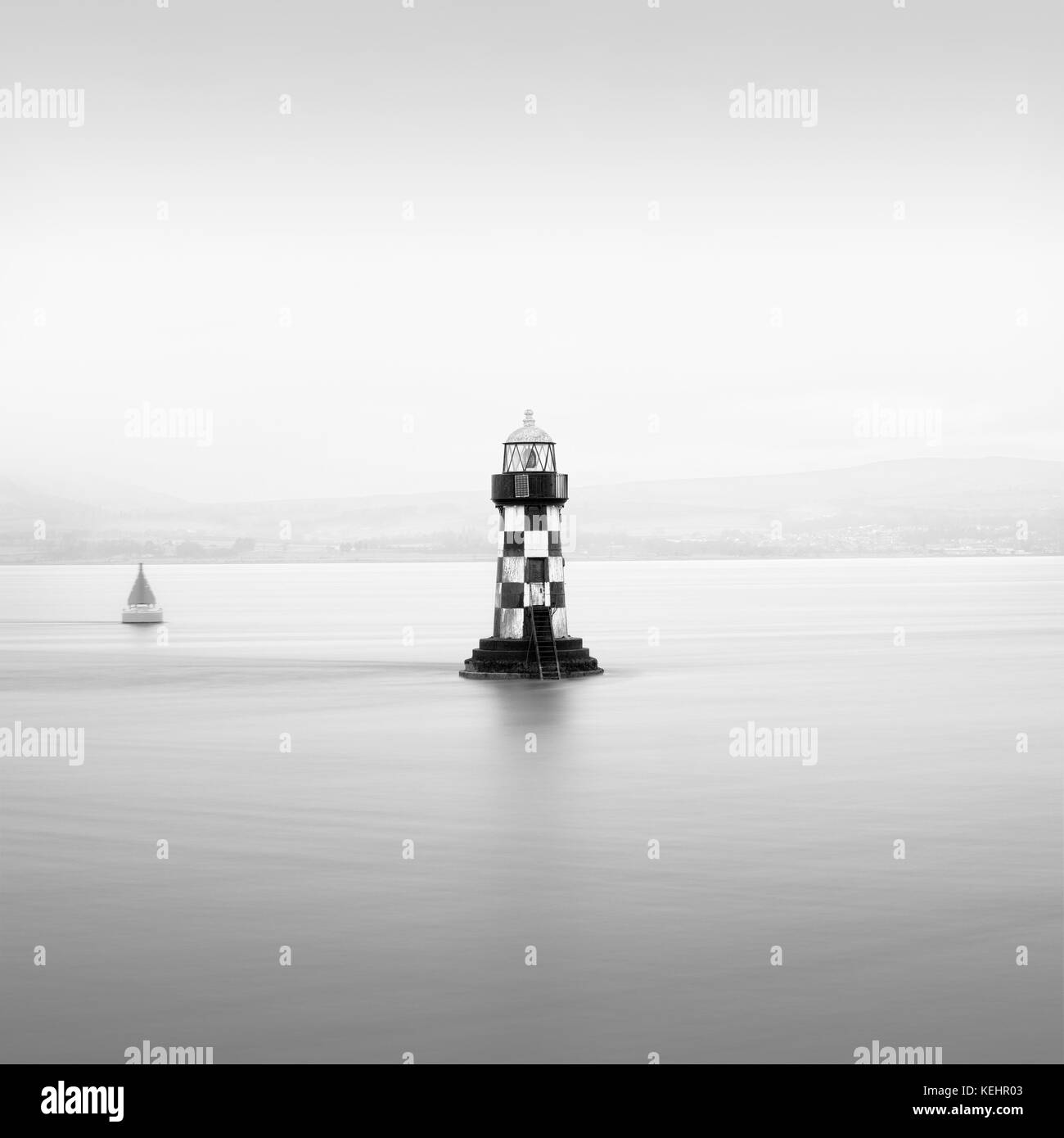 Single Lighthouse Coast Port Glasgow Alone Calm Solitude Peaceful Scotland UK Stock Photo