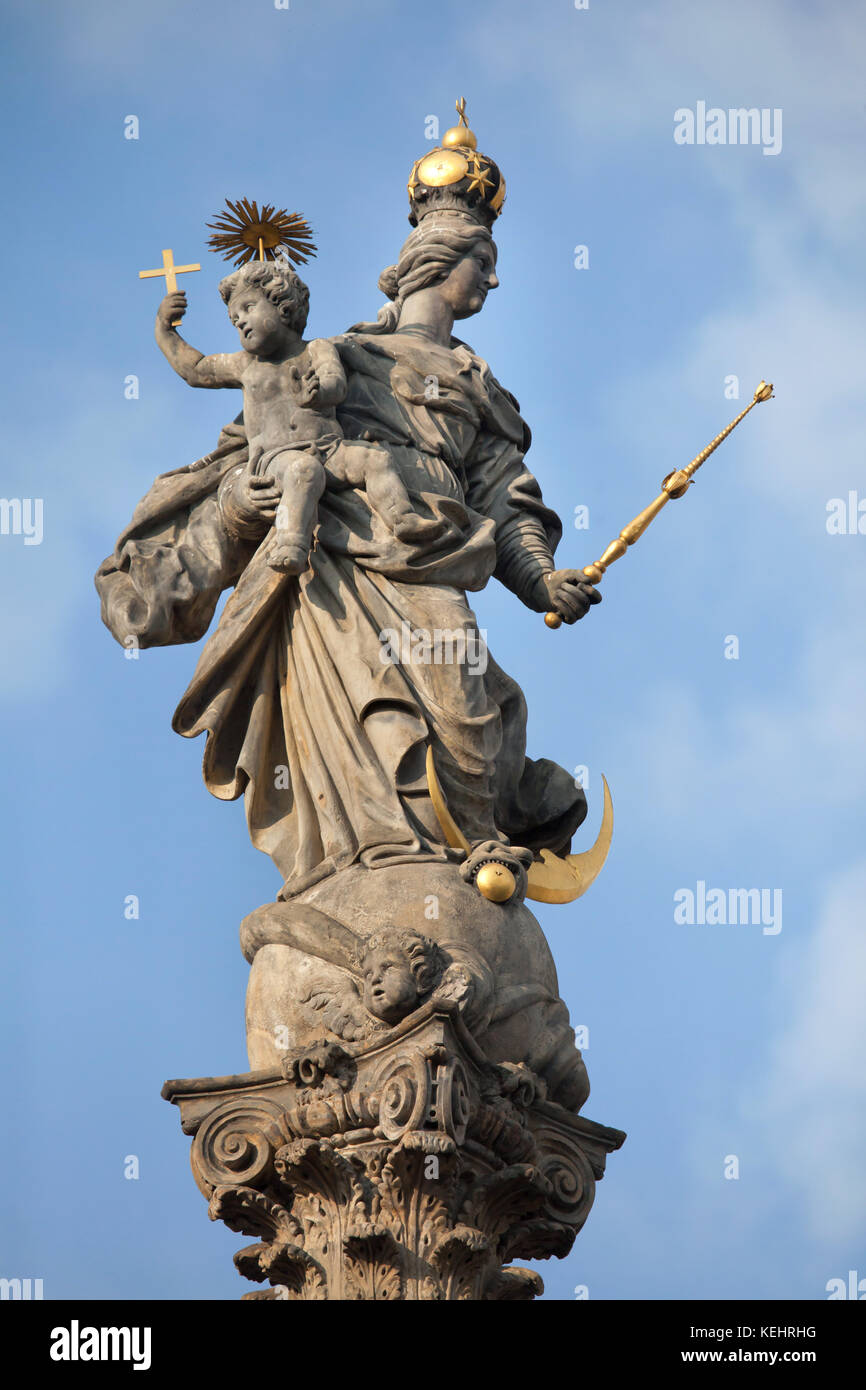Baroque statue of Madonna topped the Marian Column (Mariánský sloup) in Lower Square (Dolní náměstí) in Olomouc, Czech Republic. Stock Photo