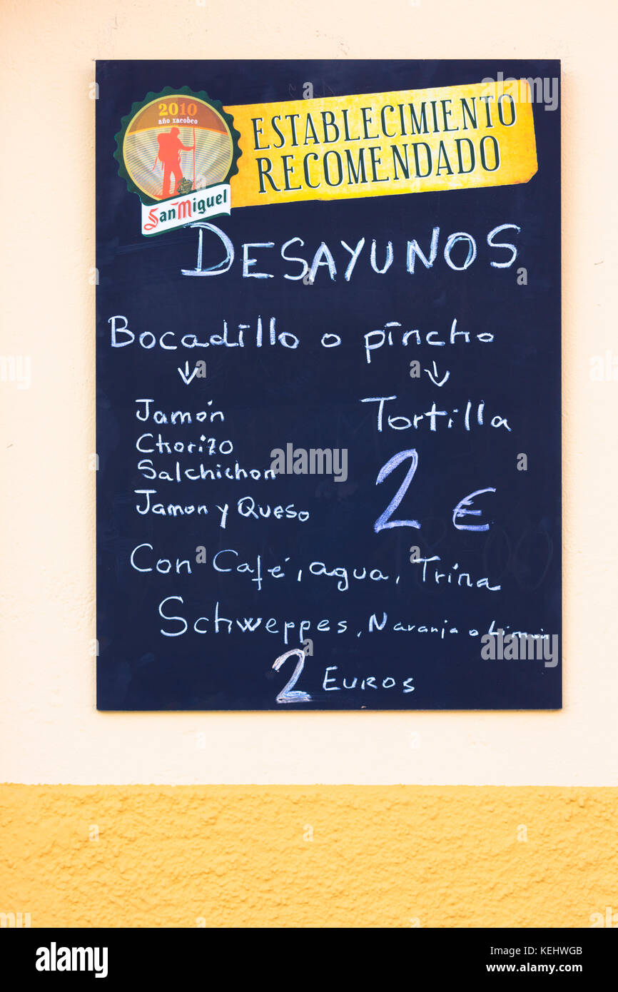 Menu tariff for dish of the day bocadillo sandwiches and pincho tortilla at bar restaurant Montanes in Plaza de Santo Martino in Leon, Spain Stock Photo