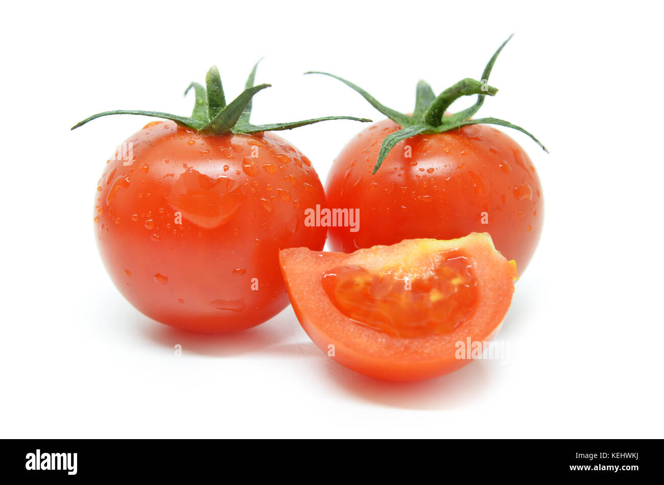 Red cherry tomato isolated on white background Stock Photo - Alamy