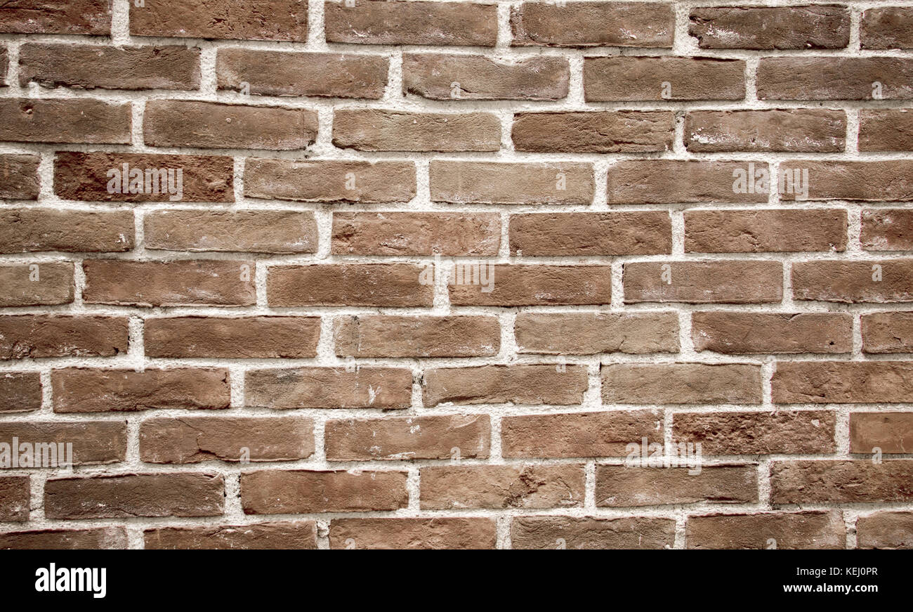Old grunge brick wall as a background Stock Photo - Alamy