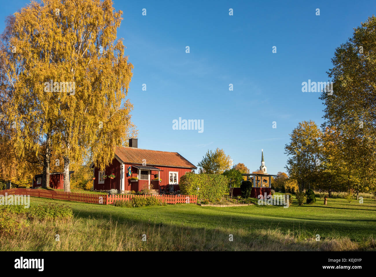 Autumn in Sweden - traditional red cottage in the countryside of ...