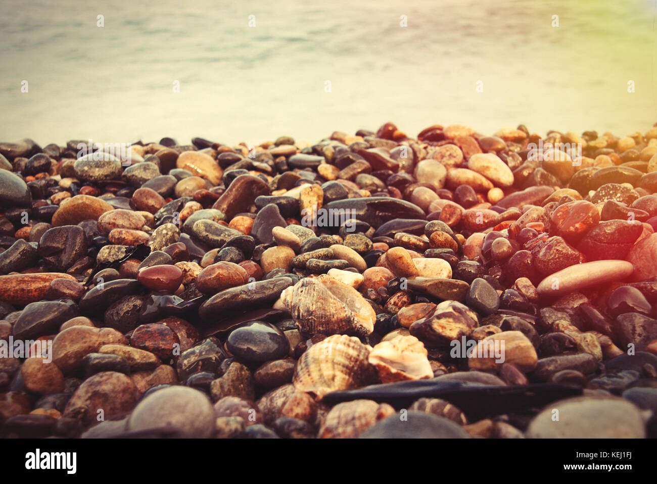 Stones background on the beach Stock Photo - Alamy