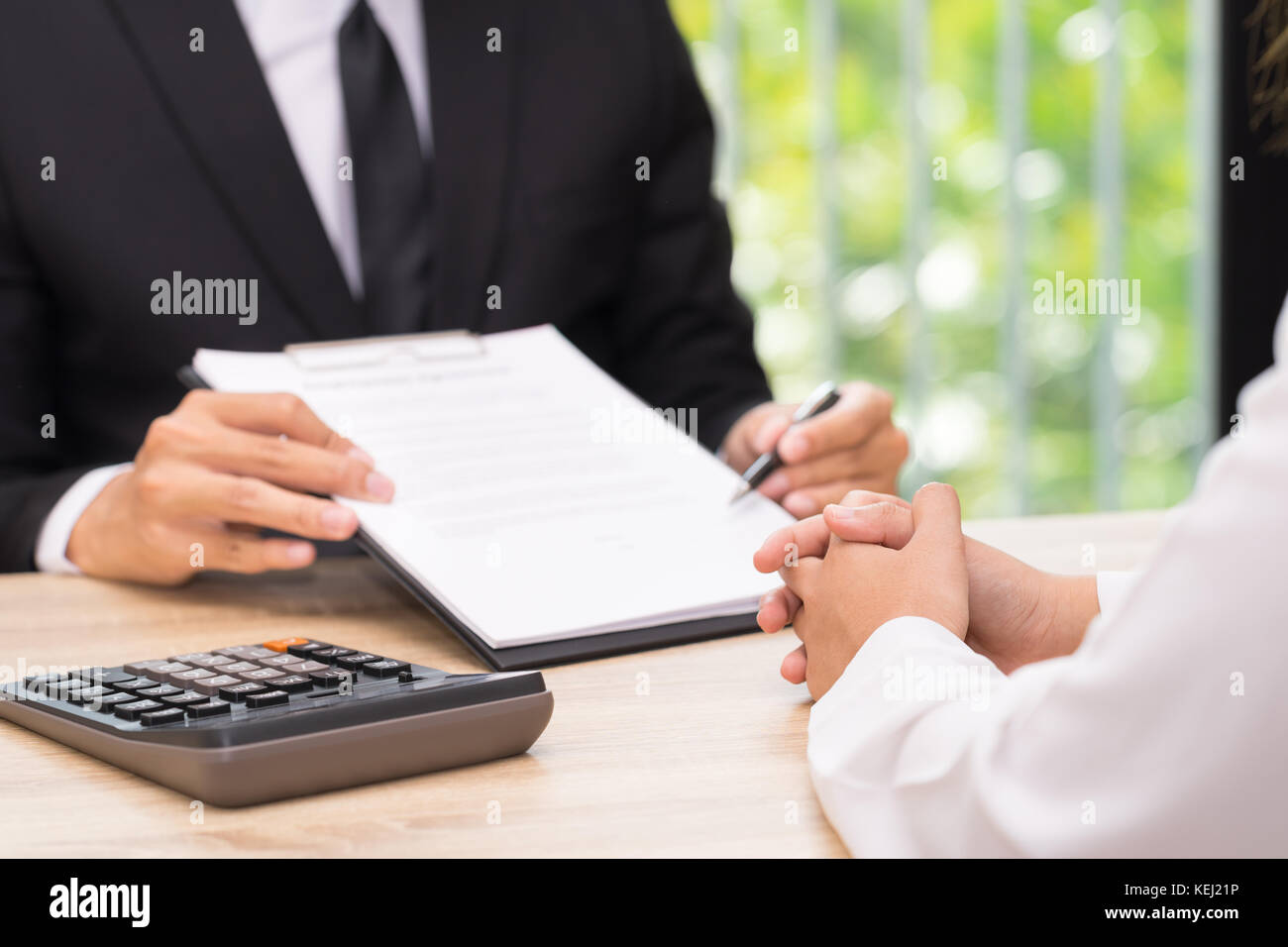 Customer or woman make a decision to sign a contract when businessman giving pen. Stock Photo