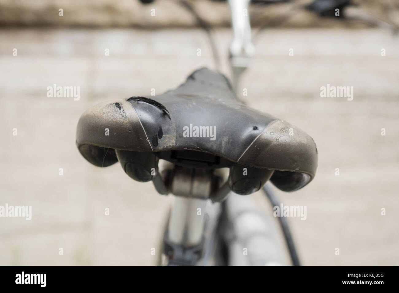 Bicycle saddle is broken from behind Stock Photo