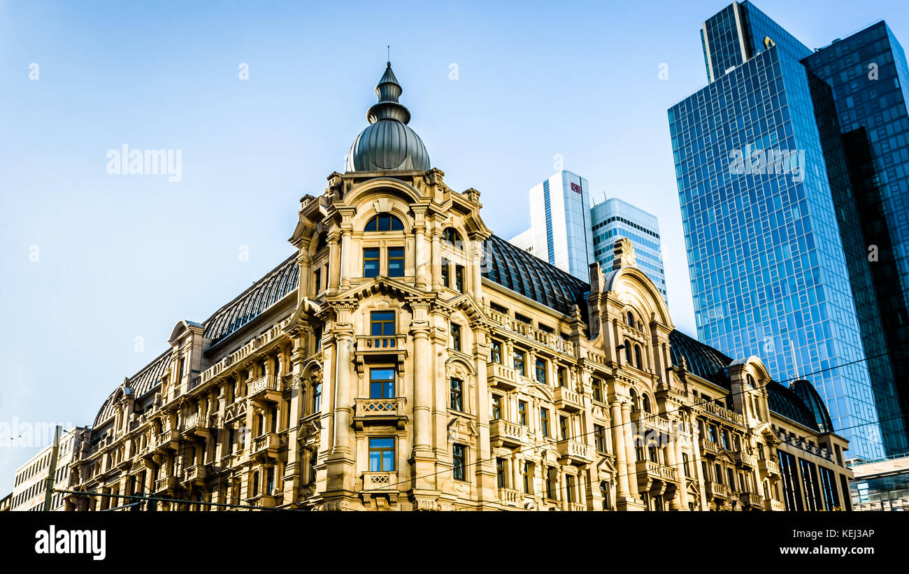 Contrast between contemporary and old building in Frankfurt am Main, Germany. Frankfurt is the largest financial center in continental Europe Stock Photo