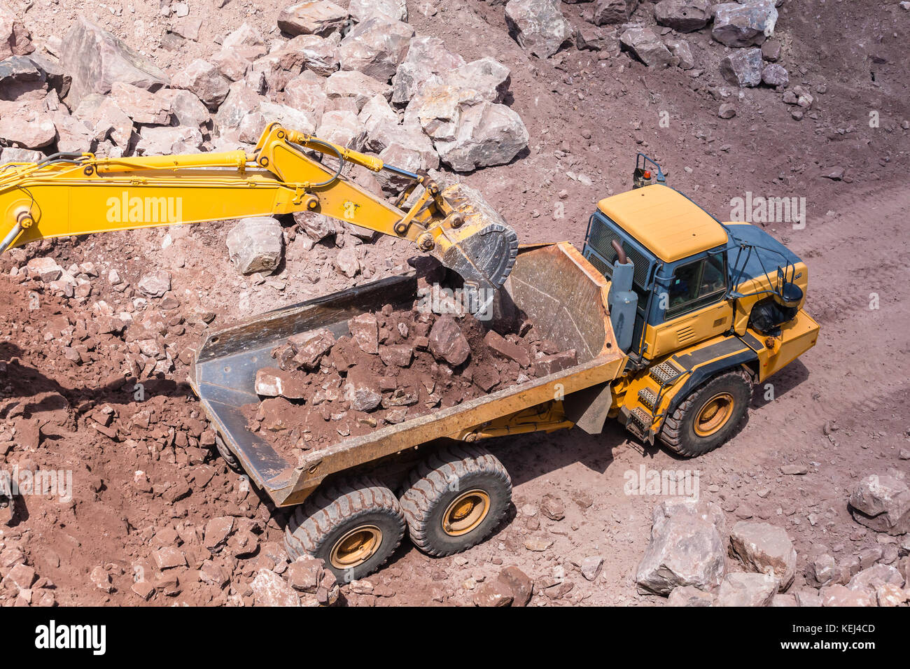 Industrial excavator machine loading construction truck vehicle heavy ...