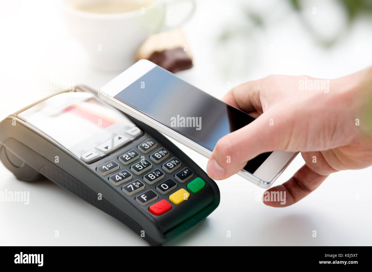 Mobile payment in cafe with smart phone nfc near field communication ...