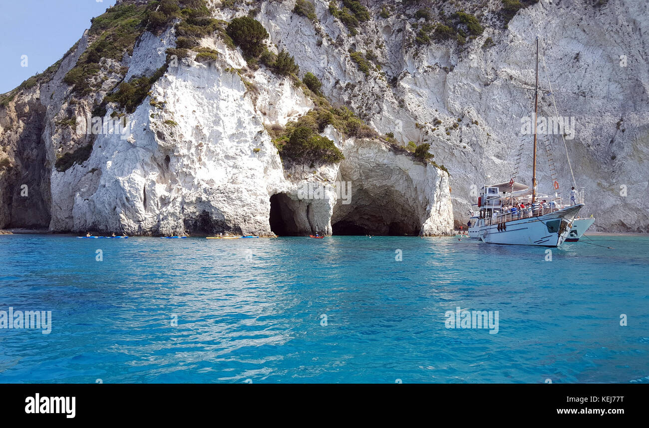 Beautiful view of blue caves and tourists yacht on Zakynthos Island in Greece Stock Photo