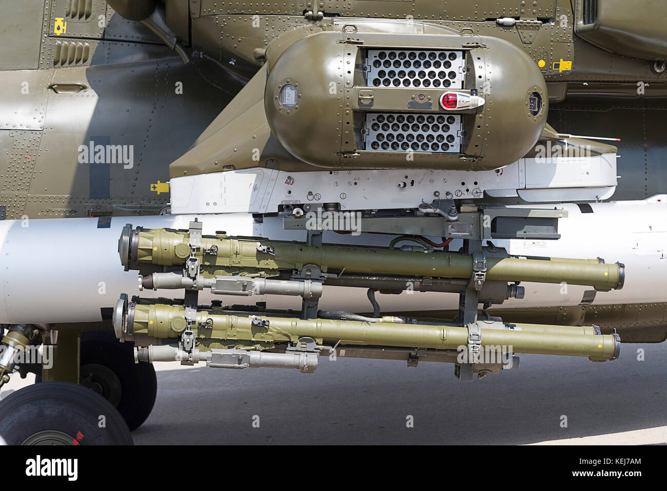 Missiles under the wing of the helicopter at the international exhibition in Russia. Stock Photo