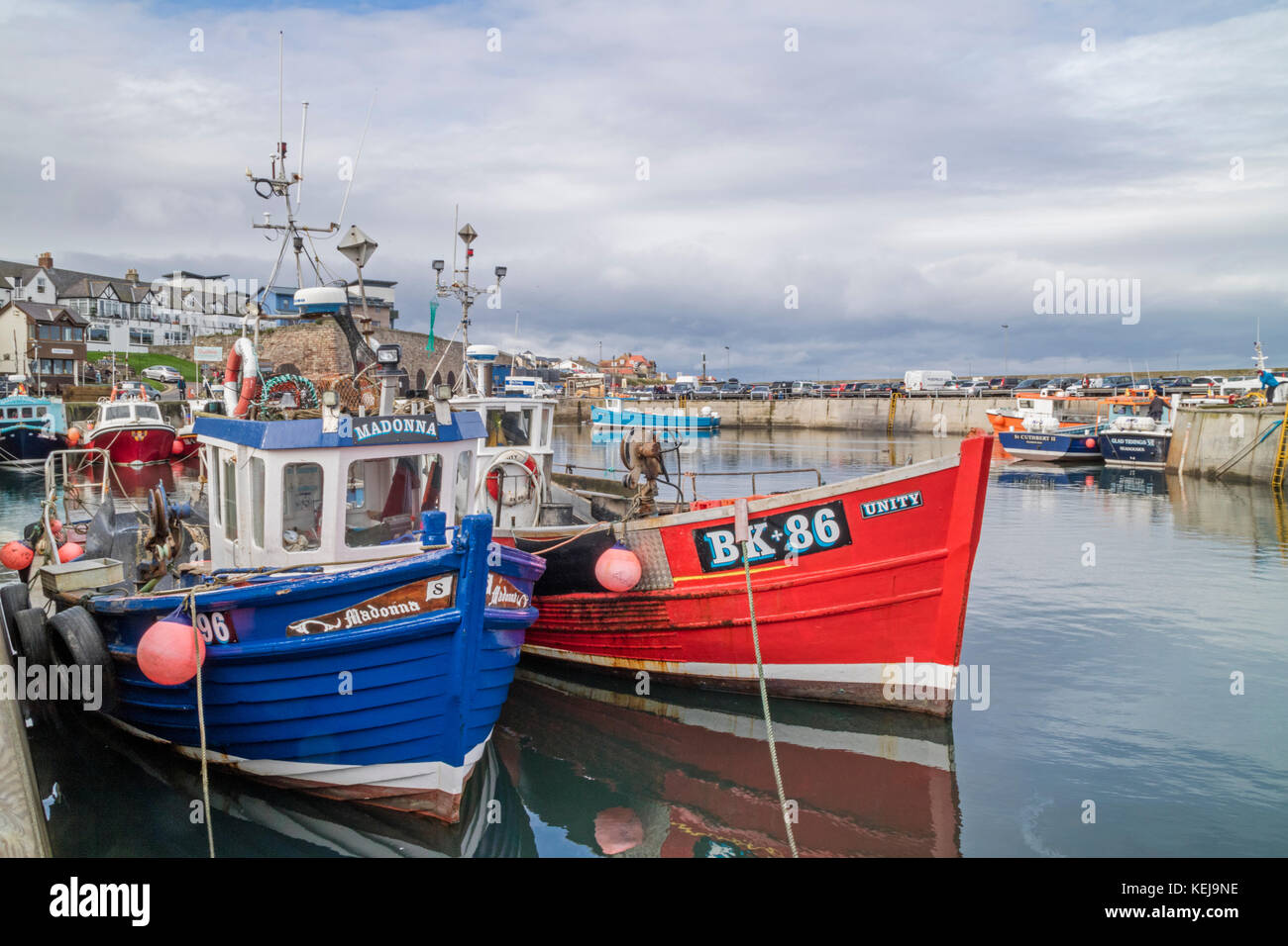 Fishing boats in Seahouses harbour on the Northumbrian coast ...