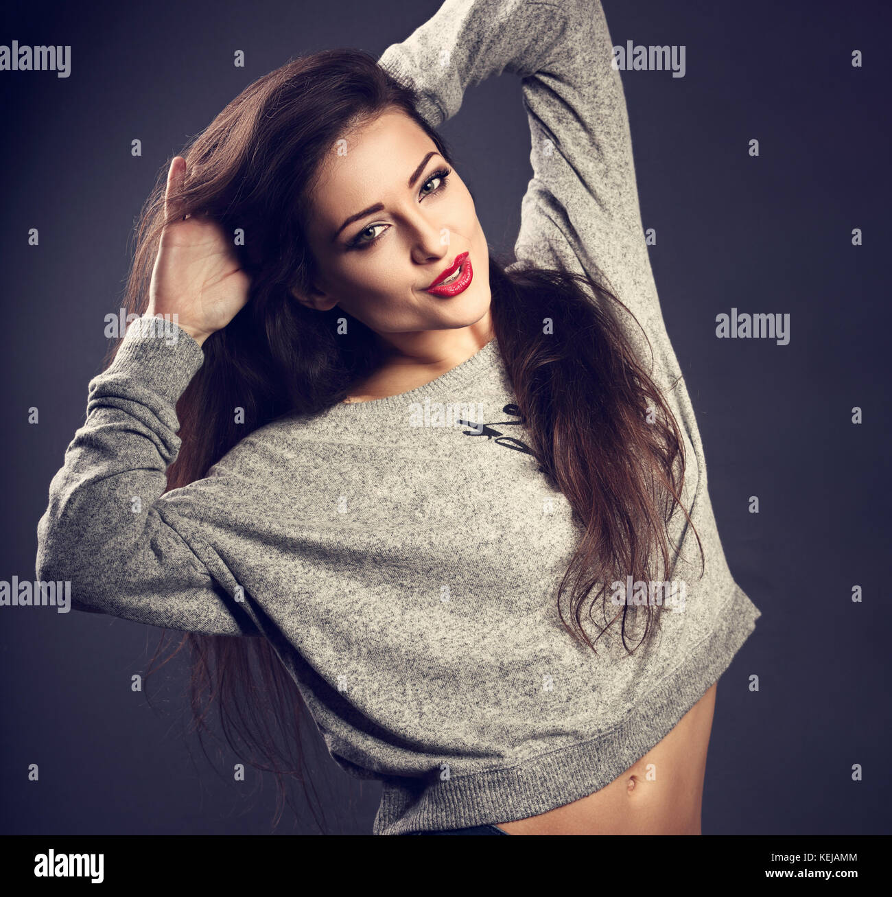 Happy Relaxing Beautiful Brunette Woman With Long Hair Style In
