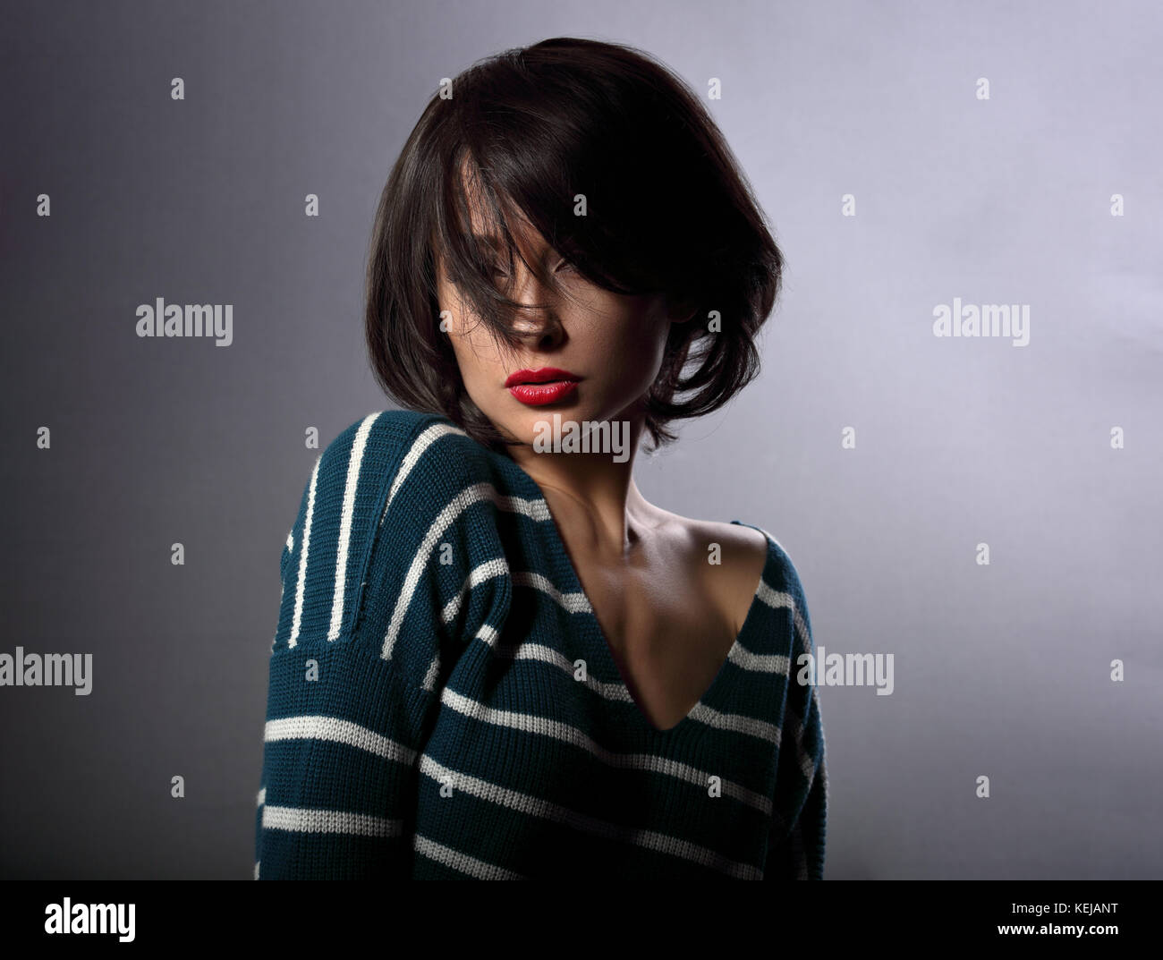 Beautiful Enjoing Woman Moving And Shaking Her Short Black