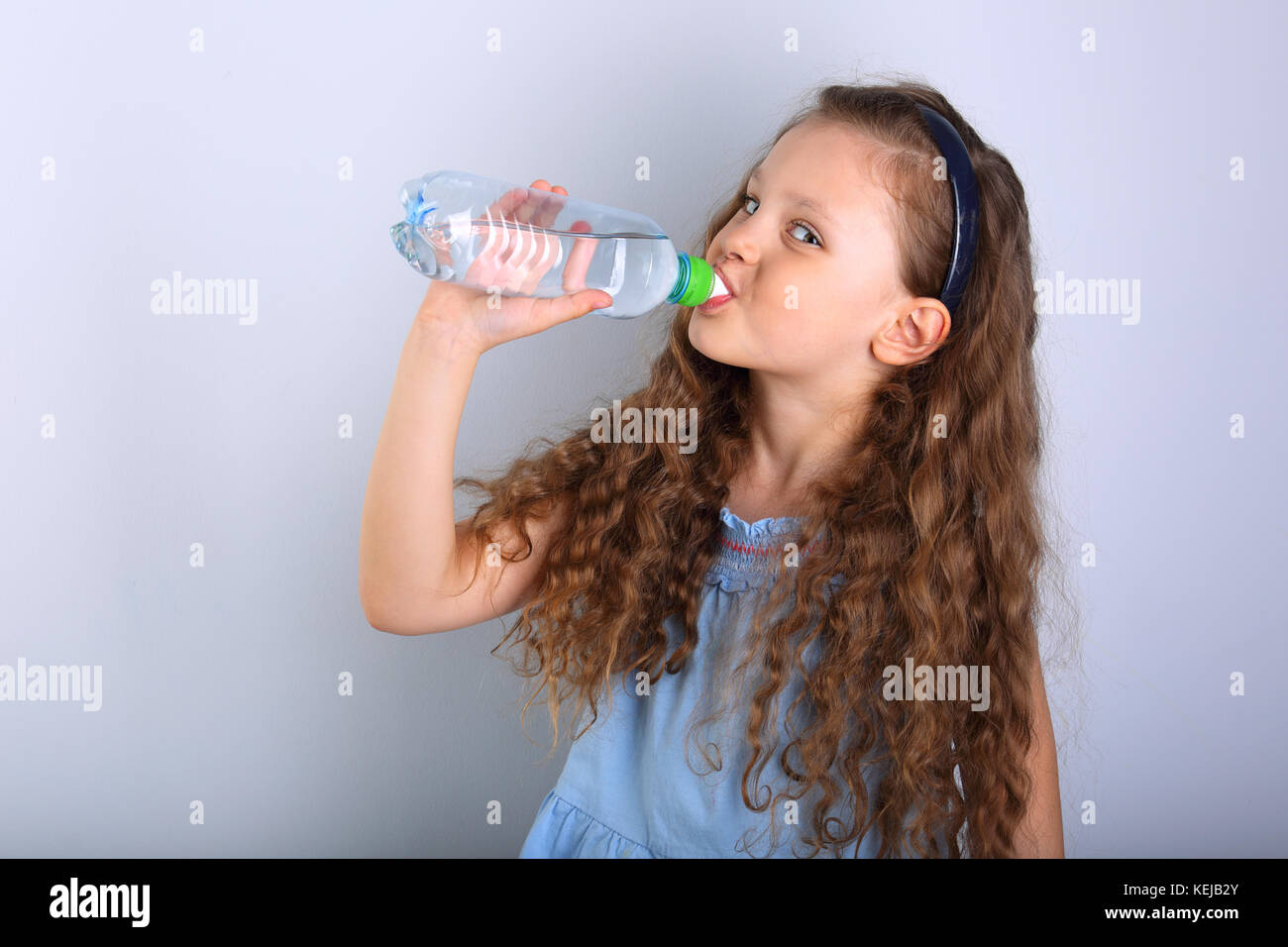 Beautiful Long Curly Hair Style Smiling Kid Girl Drinking Water