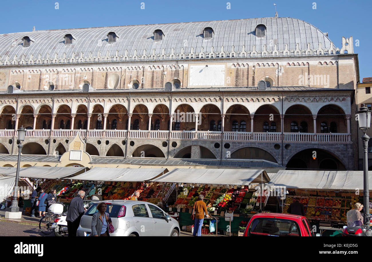 Palazzo della Ragione, medieval seat of government & commerce,  flower market on one side, & herb market on the other, Stock Photo