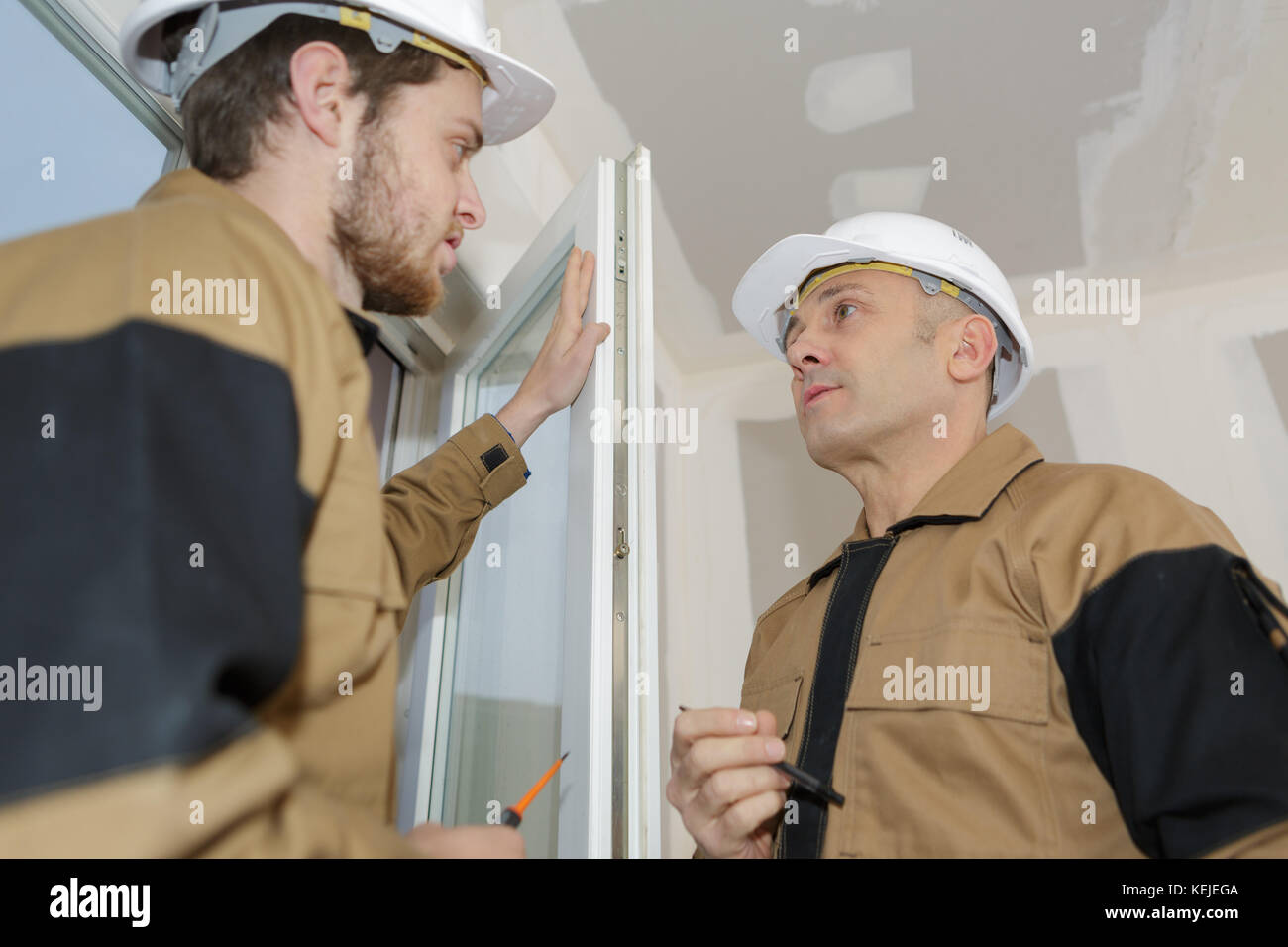 window and door glazing installer Stock Photo Alamy
