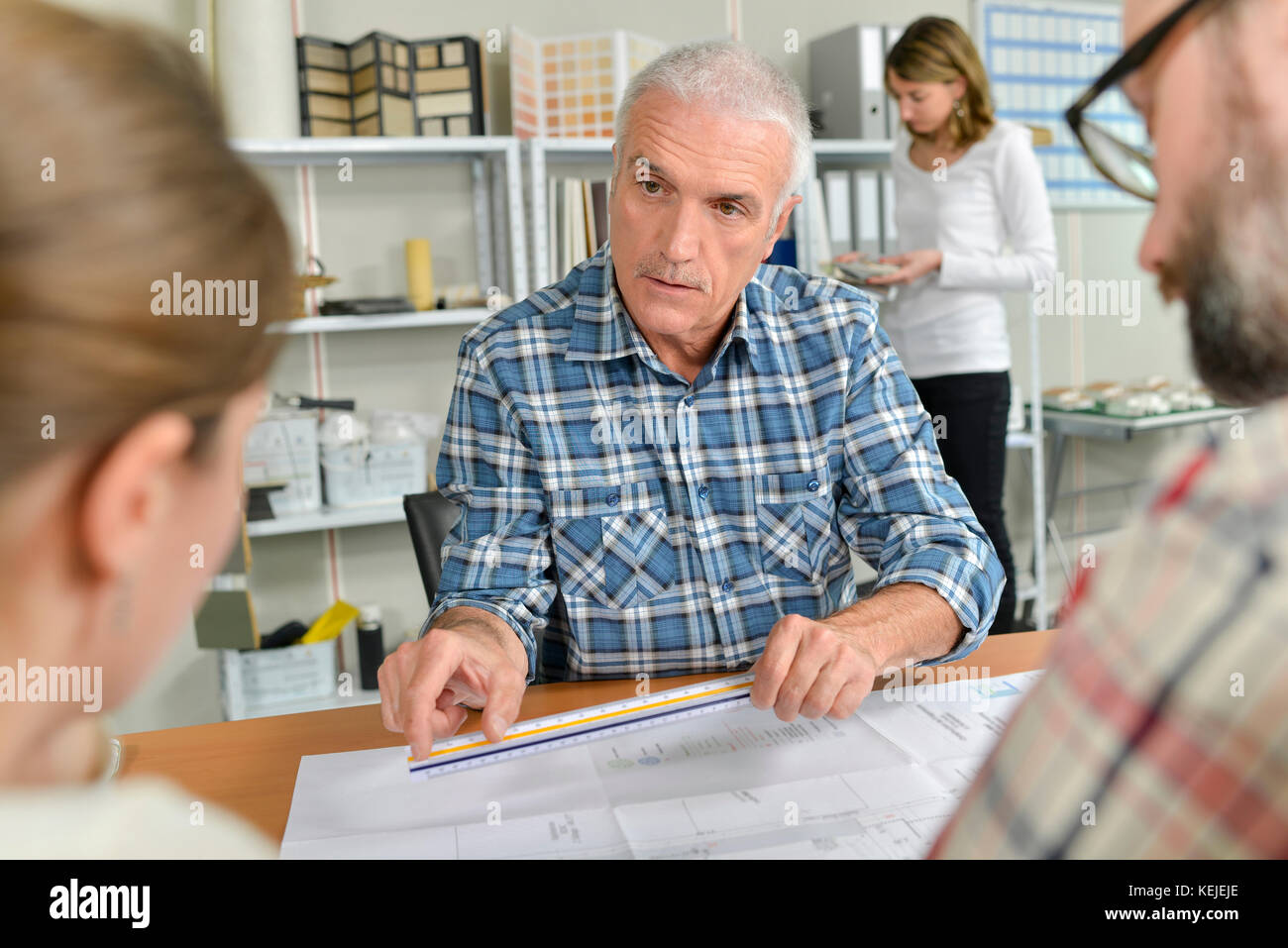 Architect explaining his designs Stock Photo - Alamy