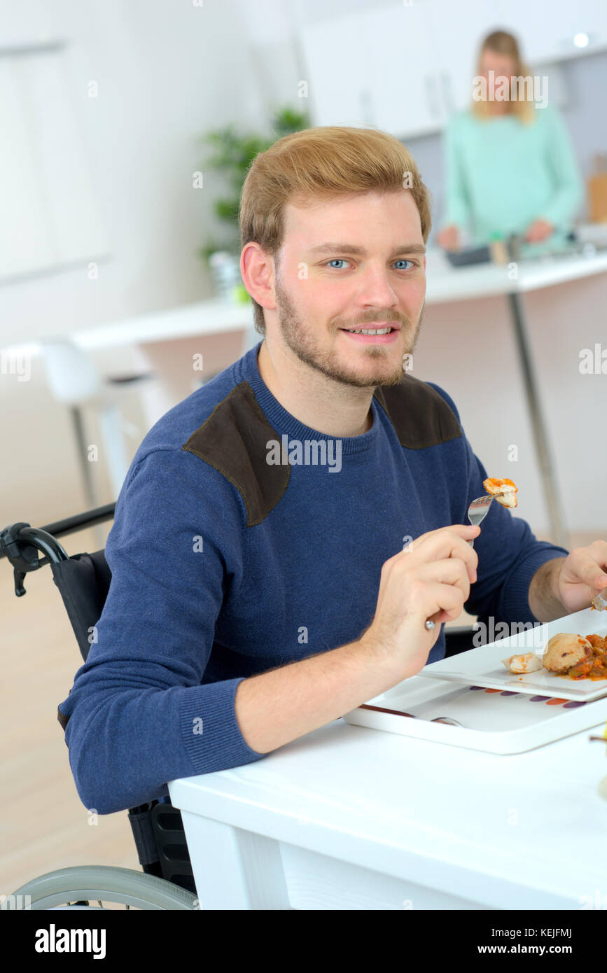eating-a-meal-his-girlfriend-prepared-stock-photo-alamy