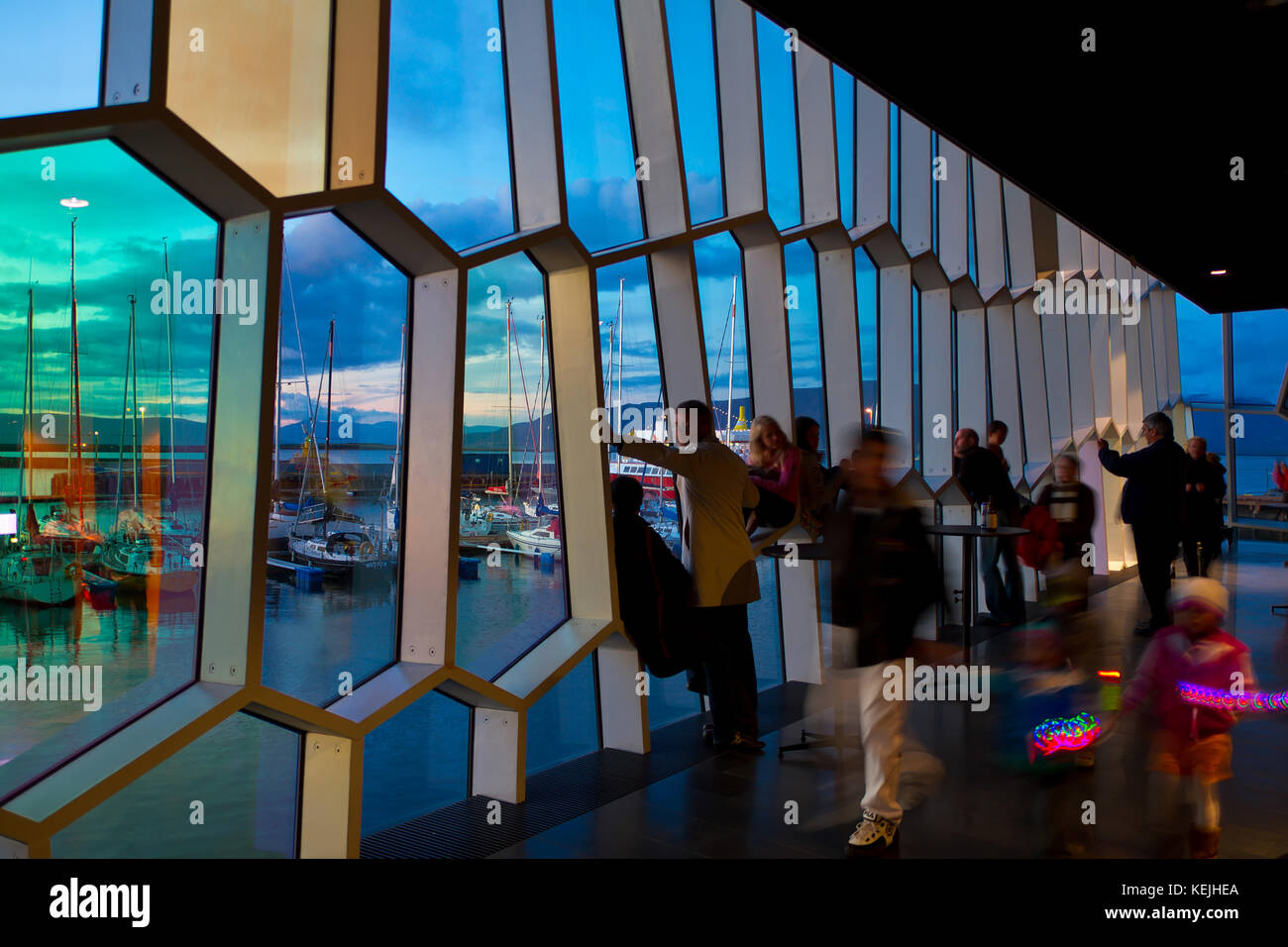 Harpa concert hall and conference center in Reykjavík, Iceland. The building features a distinctive colored glass, inspired by the basalt landscape Stock Photo