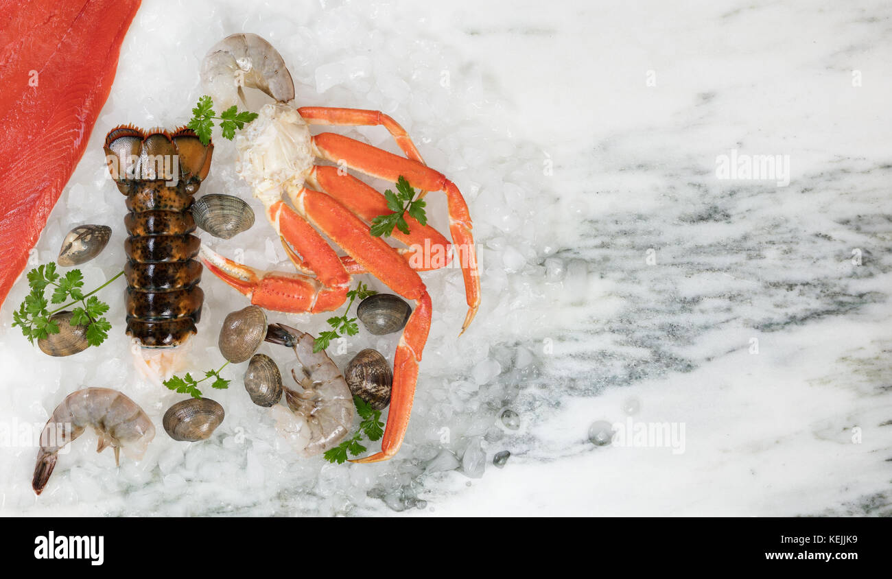 Fresh Seafood with ice on marble table Stock Photo