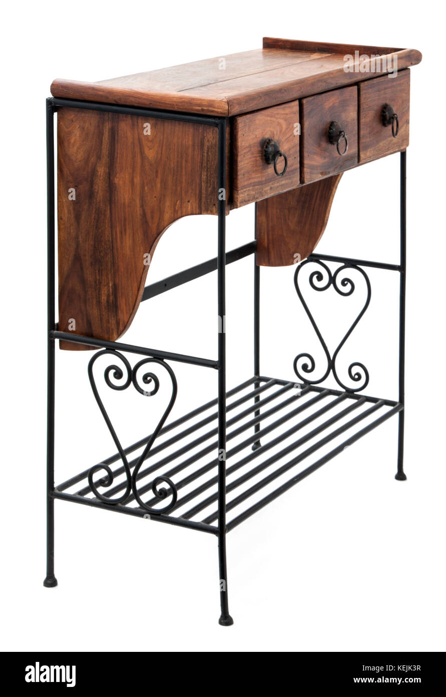 Telephone side table with ornate wroughtiron metalwork base Stock Photo Alamy