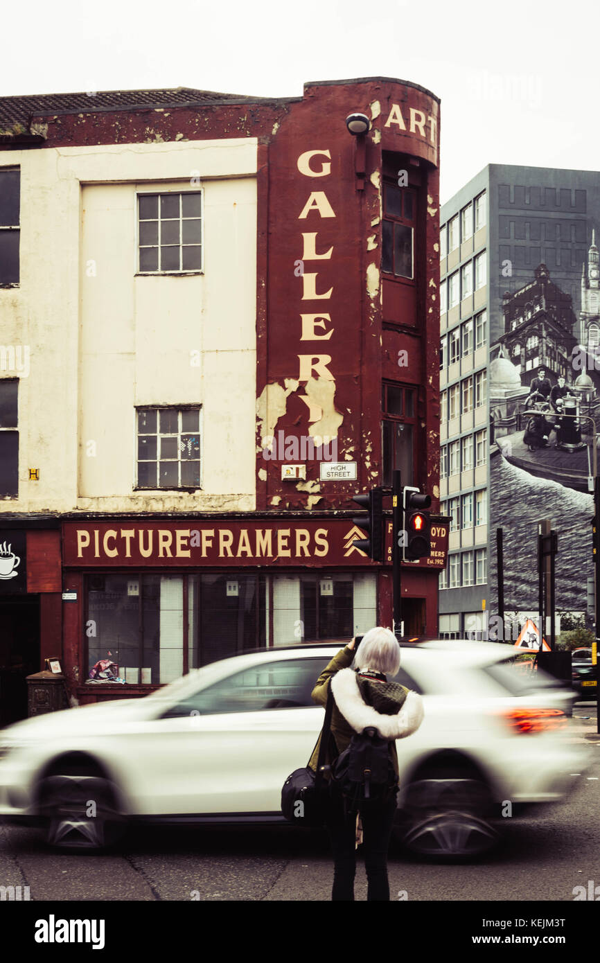 Derlit Picture Framers Building with Girl, Glasgow, Scotland Stock