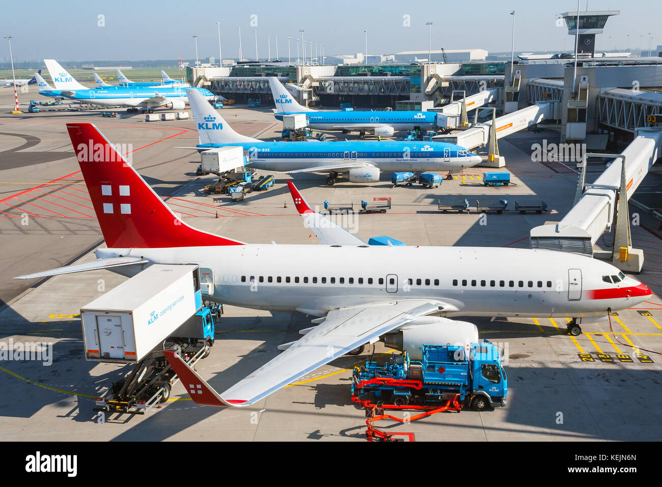 A Boeing 737 of Privatair being prepared for flight from Amsterdam's Schiphol Airport. Stock Photo