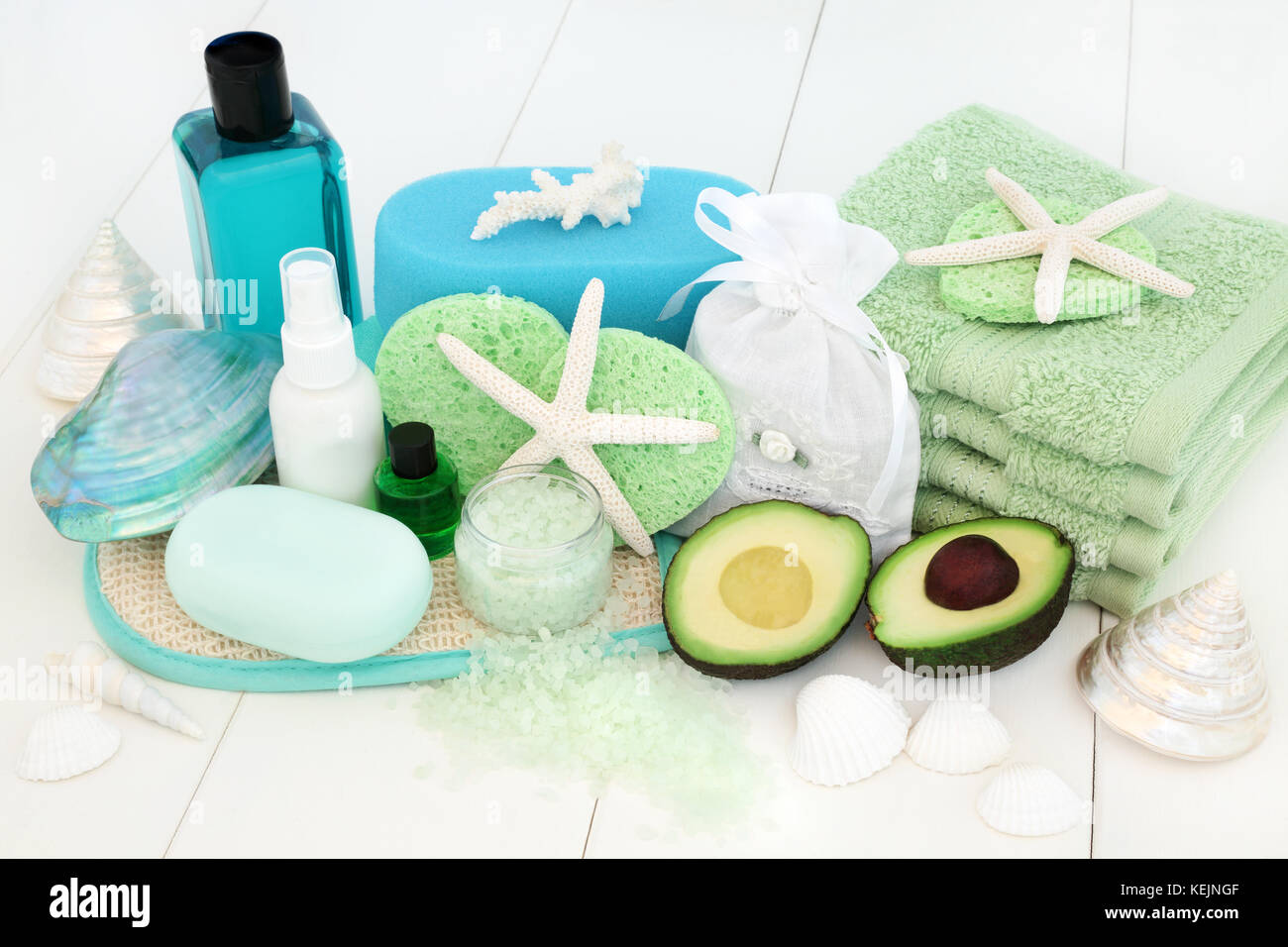 Skincare and body care spa beauty treatment with avocado, bath salts, sponges, face cloths, tea tree aromatherapy essential oil & body lotion. Stock Photo