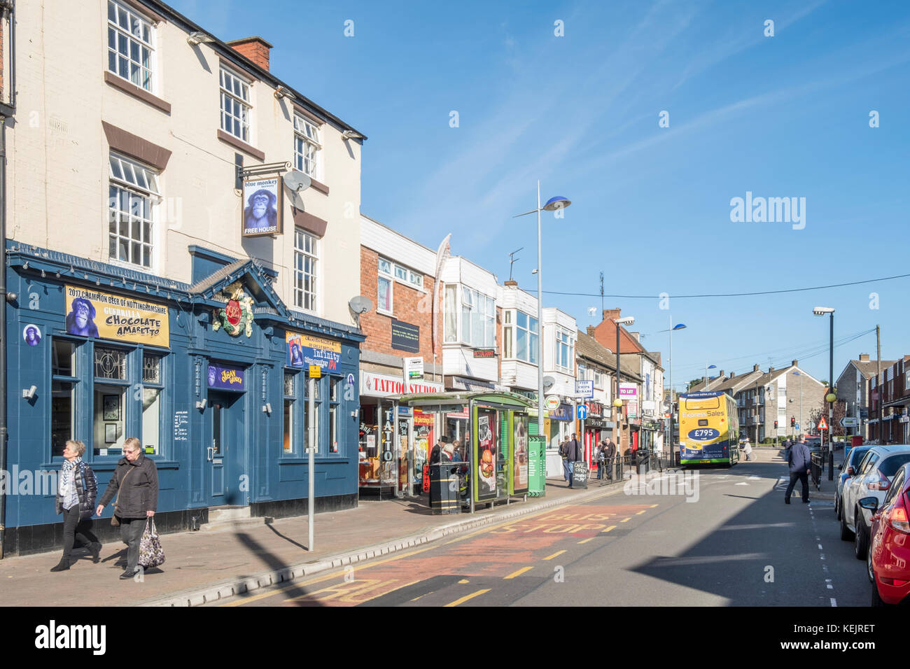Pub and shops along the main shopping area in the town centre of Arnold, Nottinghamshire, England, UK Stock Photo