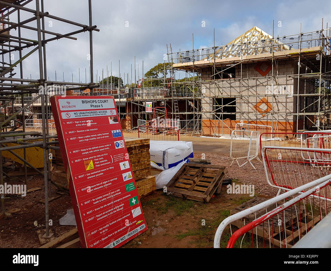 Exeter, England, UK - October 2017: A sign warns of no unauthorized access and health and safety rules for a Redrow housing development called Bishops Stock Photo