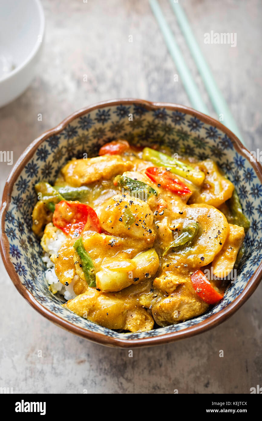 Katsu green chicken curry. Cooked jasmine rice with cooked marinated
