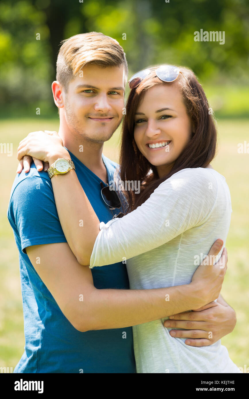 Lovely couple hugging hi-res stock photography and images - Alamy